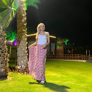 Beach Skirt "Pink Bloom" worn by a blonde girl in Egypt